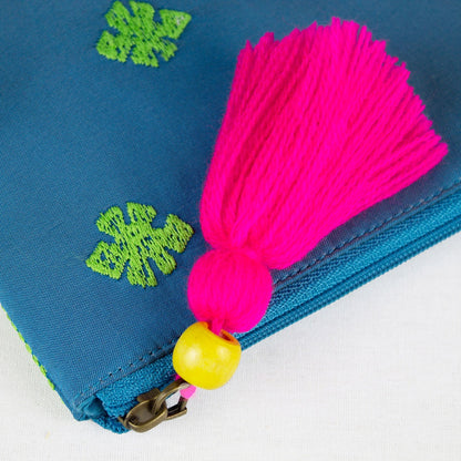 trousse verde e turchese con nappa