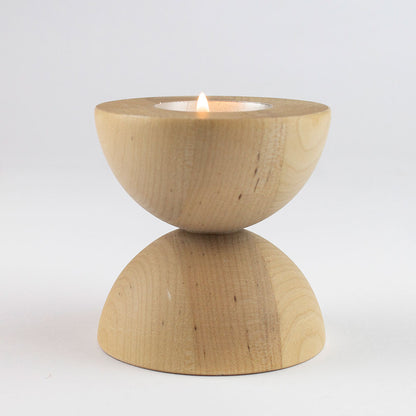 Portacandele e portalumini in legno chiaro